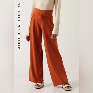 Athleta x Alicia Keys Intention Pant in shade Foliage Orange